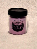 "Hand-poured Violet Voodoo scented candle 9oz with citrus, peach and floral notes"