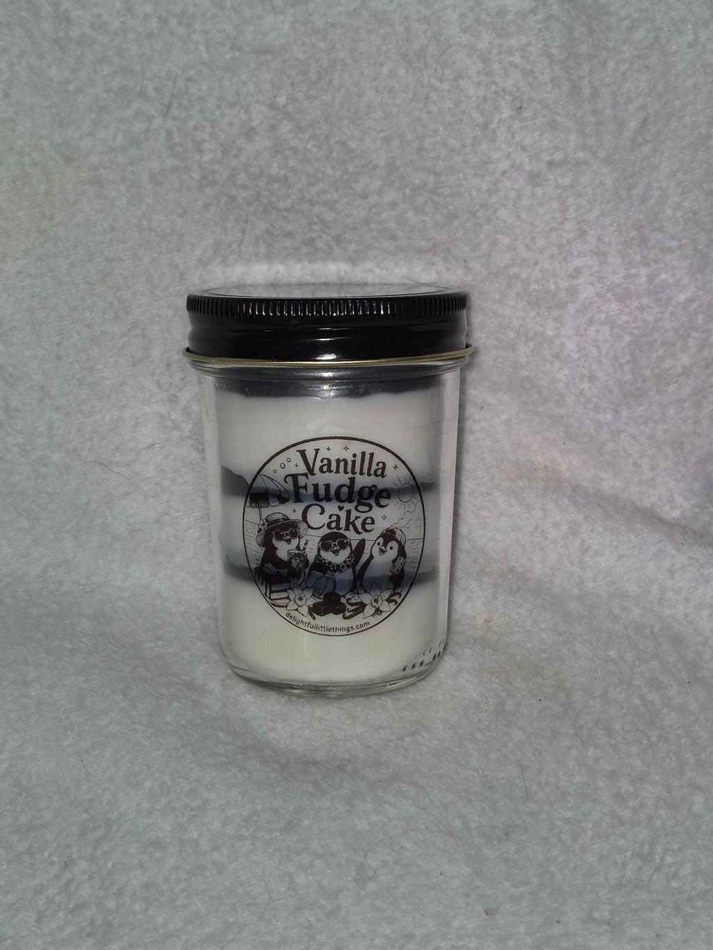 "Hand-poured vanilla fudge cake layered scented candle in a 9oz jar by Delightful Homemade Things"


